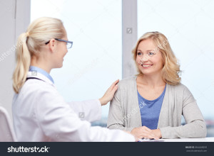 stock-photo-doctor-talking-to-woman-patient-at-hospital