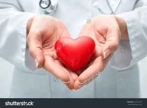 stock-photo-female-doctor-with-the-stethoscope-holding-heart