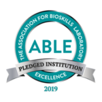 The Association for Bioskills Laboratory Pledged Institution in 2019 Logo